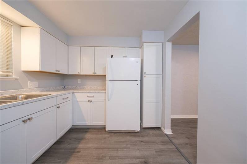 Kitchen is 11X9, beautiful white cabinets with lots of storage.