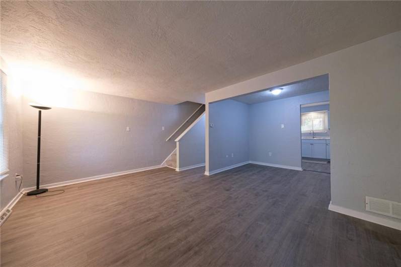 Living room, dinning area and stairs to second floor bed rooms.