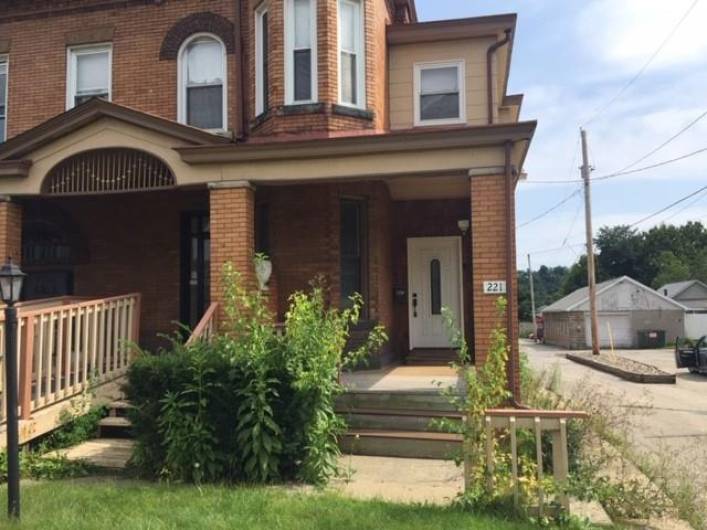 Second of two private front entrances has a foyer and leads to second/third floor