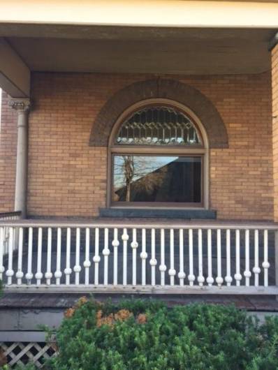 Porch and original leaded glass window