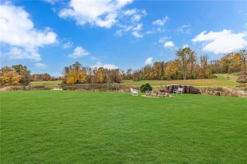 fire pit and large fishing pond