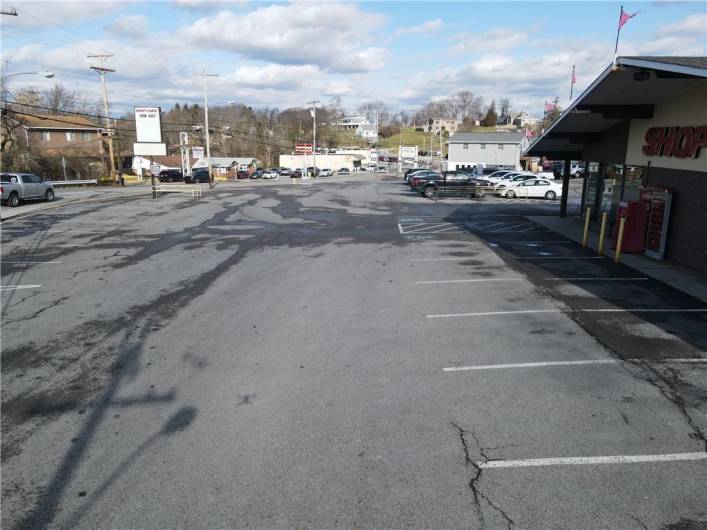 Approximately 43+ parking spaces. Includes spaces to the left of bldg shared with tenants occupying adjacent shops