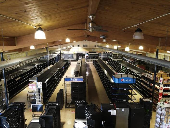 Interior view from front of bldg.  Ceiling heights range from 8ft - 18ft