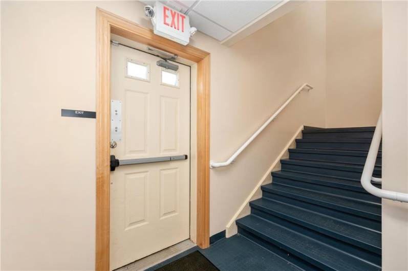 Rear private staircase for upper unit