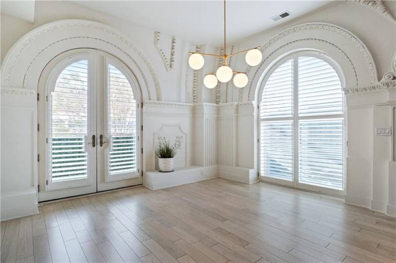 Dining area with arched windows