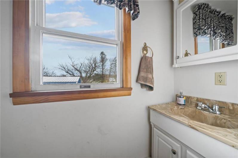 Half Bath in Bonus/Flex Room off Kitchen