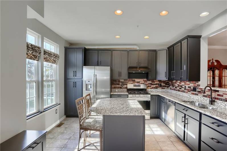 Stunning updated kitchen will impress any home chef. Meal creation and clean will be in a breeze in this space.