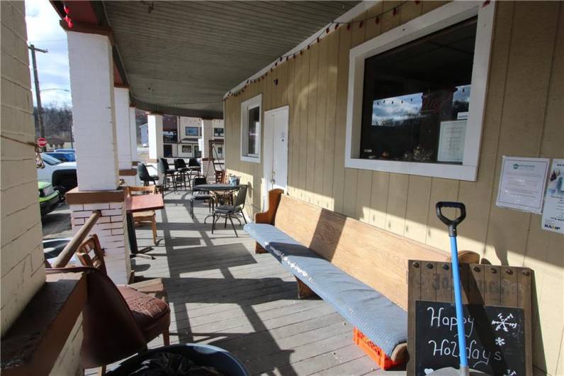 Great outdoor entertainment area w/ Porch around to both entrances