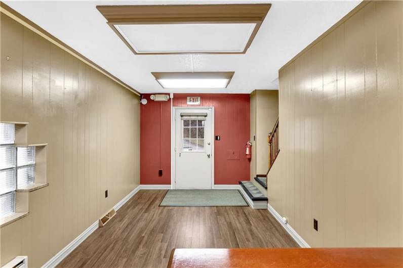 Another View of the Reception / Administrative Desk Area and Front Door.