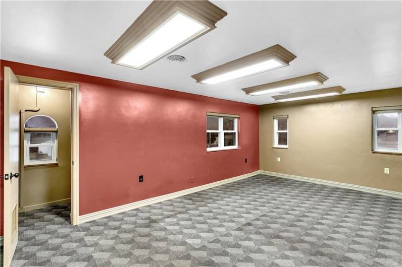 19x11 Office / Meeting Room #2 on Upper Level with Large Closet, Newer Carpet, 3 Windows, Custom Pull Blinds.