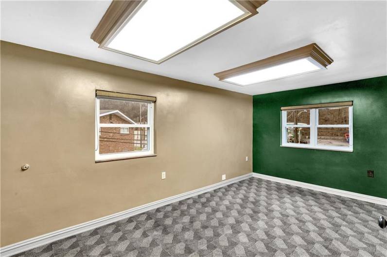 13x11 Office/Meeting Room #3 with Custom Pull Blinds, Newer Carpet, and Closet with Shelving.