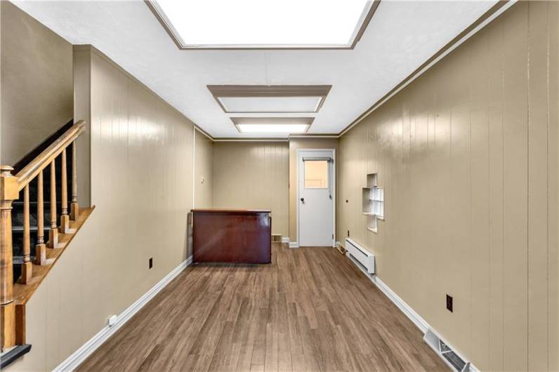 19x9 Reception / Administrative Space with Acrylic Vinyl Flooring, Fresh Paint.  Doorbell Rings to Second Level.