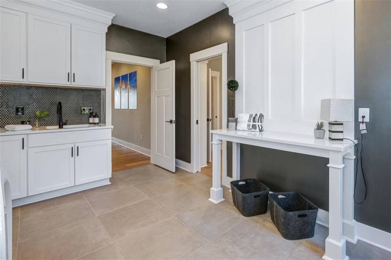 Generous laundry room on same floor as owner's suite