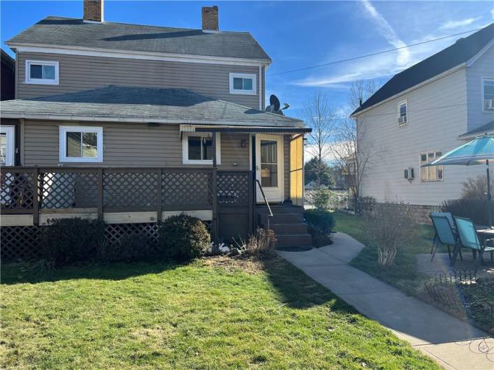 Large Partially fenced backyard with separated decks