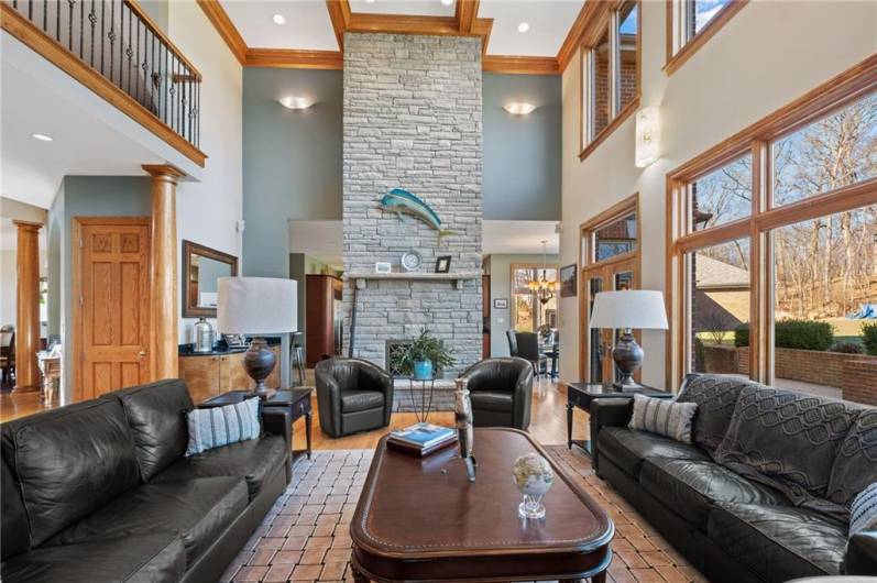 Family Room seating area and double fireplace to Kitchen!