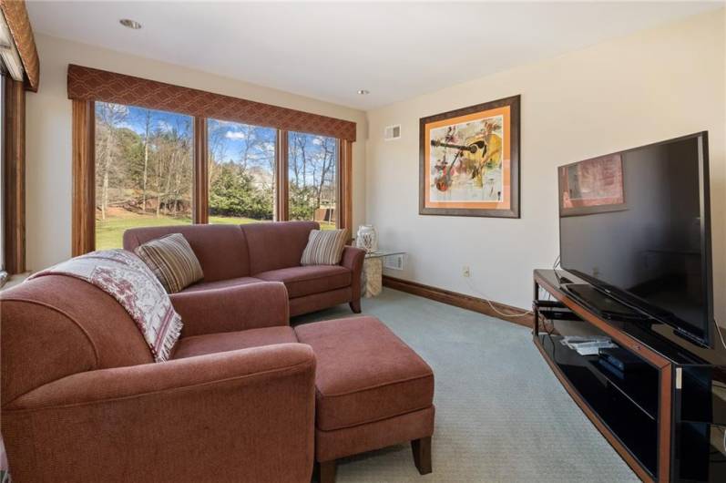 Master Bedroom private sitting area overlooks backyard!