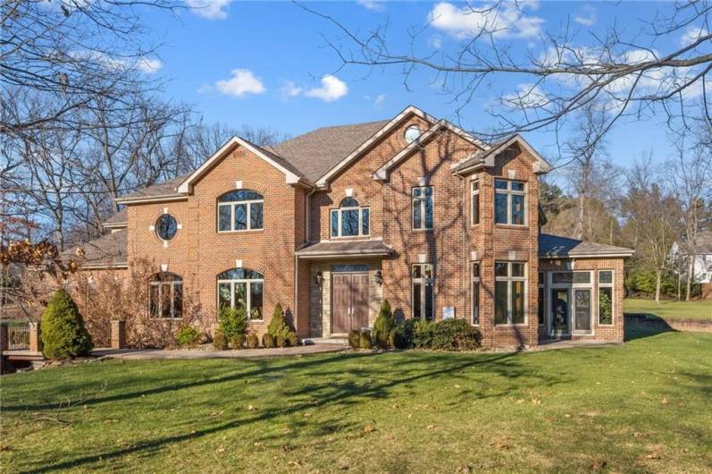 Solid brick home on 2+ acres!