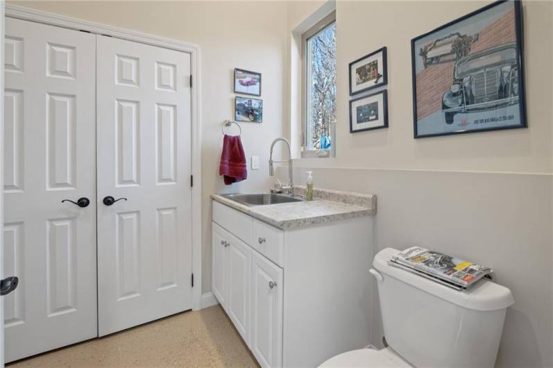 Detached Garage has a powder room and storage area!