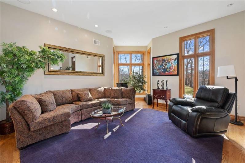 Formal Living Room with carpet inlay and hardwood flooring!