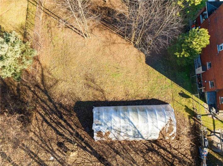 Right to Left, 6730, 6728, 6726 Simonton (125-K-82, 125-K-80, 125-K-81), View north-west, fenced in previously home of Tree Pittsburgh