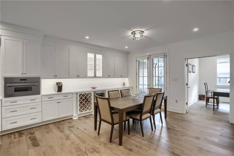 The dining room features French door access to a charming patio with TV hook up.