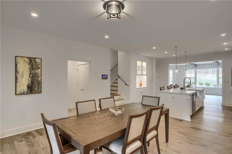 Sprawling hardwood flows through the main level of this home and complements the modern touches.