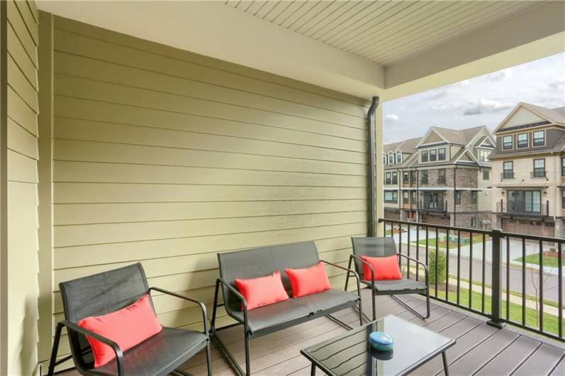 Sip your morning coffee or after a long day, an evening beverage on the low maintenance porch.