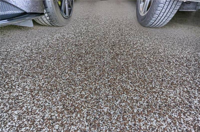 The garage features apoxy flooring.