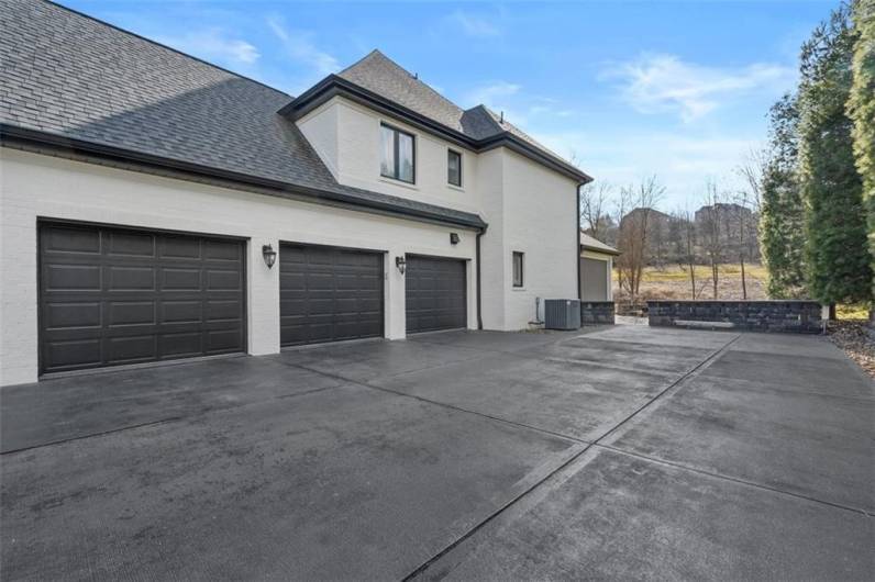 Oversized three car attached garage.