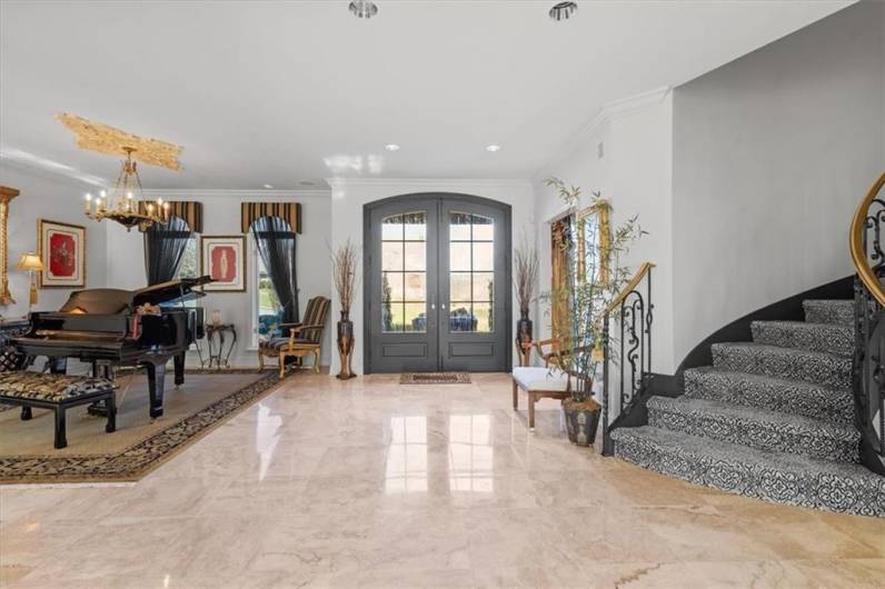 Gorgeous Travertine floors span through-out the foyer and first floor.