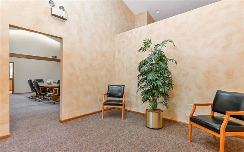 View from Reception Area into Conference Room ~ Fully Equipped Kitchen is behind the wall in front of you