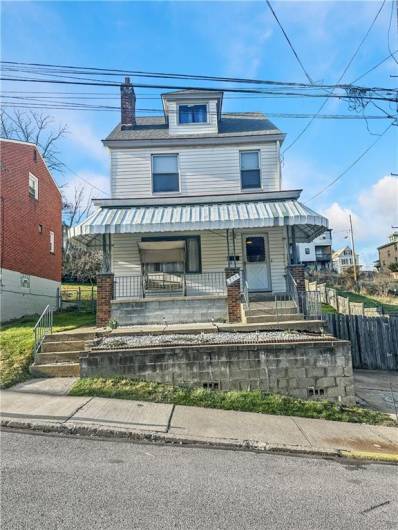 Front Exterior--Large Colonial Style home on double lot in hot Carrick neighborhood waiting for you to make it home! New Roof (2019)!