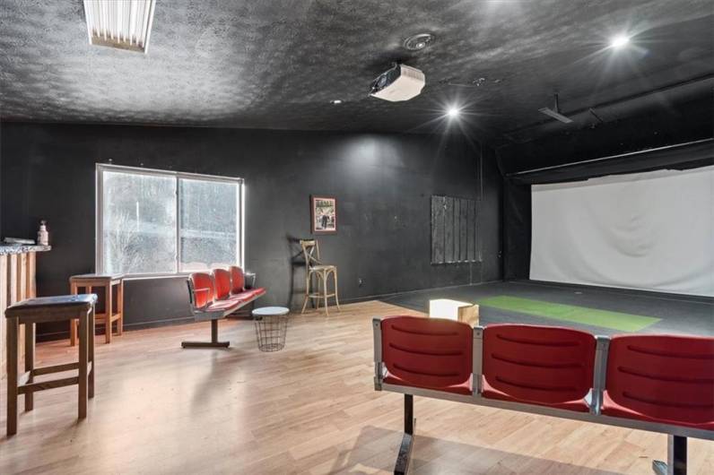 Vaulted ceiling, oversized window and space round out this room on the upper level.