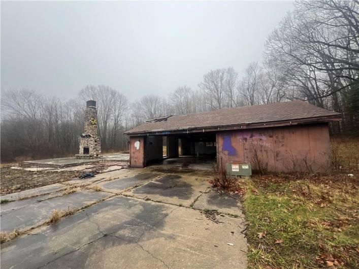 free-standing fireplace/garage where house used to be