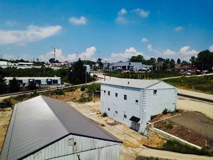 New Metal Roof on Back Warehouse Building.