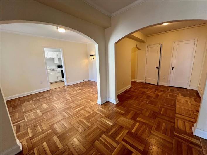 View of the bonus room and into the dining room/kitchen