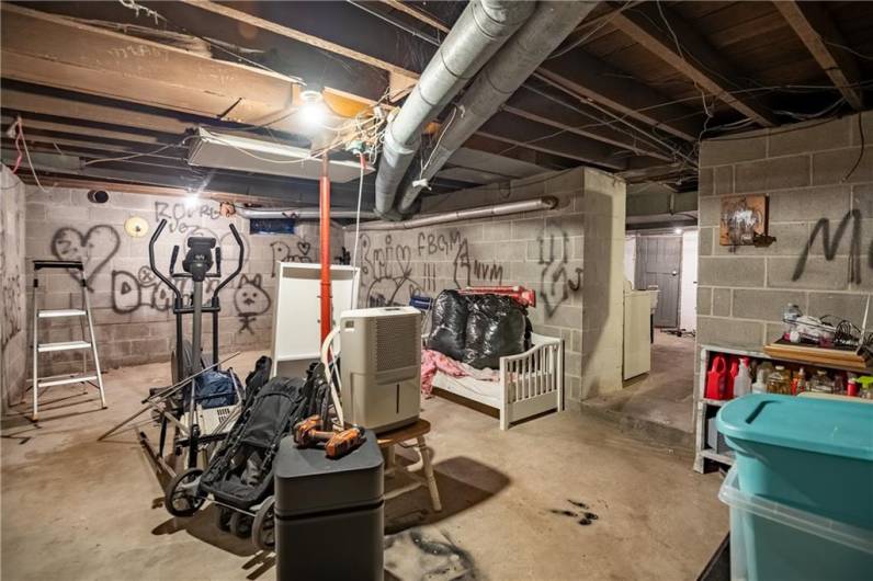 A large bonus room in the basement could easily be made into an additional living space.