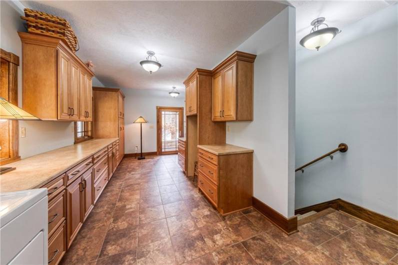 Multi purpose laundry/butler's pantry area.