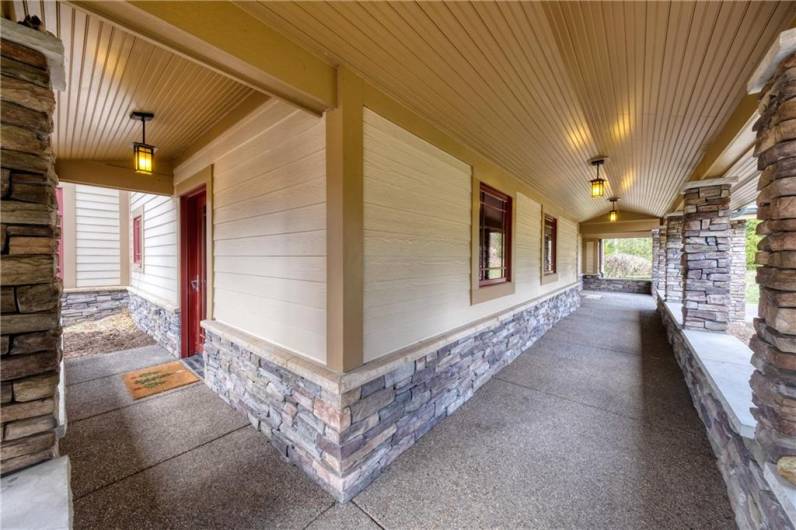 Low maintenance stone detail and exposed aggregate walkways lead to the front and side entrances.  Easy handicap accessible.