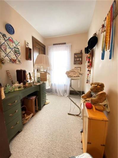 HALLWAY TO THE ATTIC DOOR