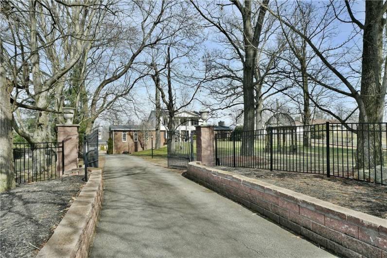 What An Impressive Entry Through These Gates.  Private Gazebo Garden in Front Yard.