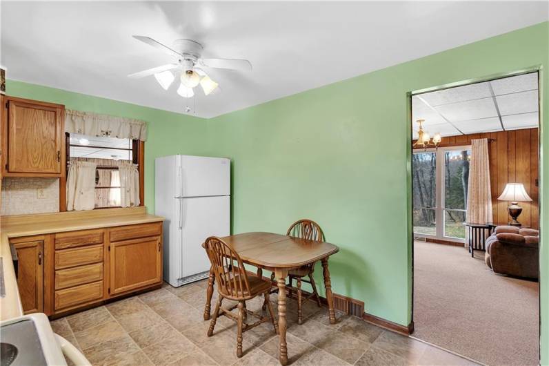 The eat-in kitchen is conveniently located off of the living room...