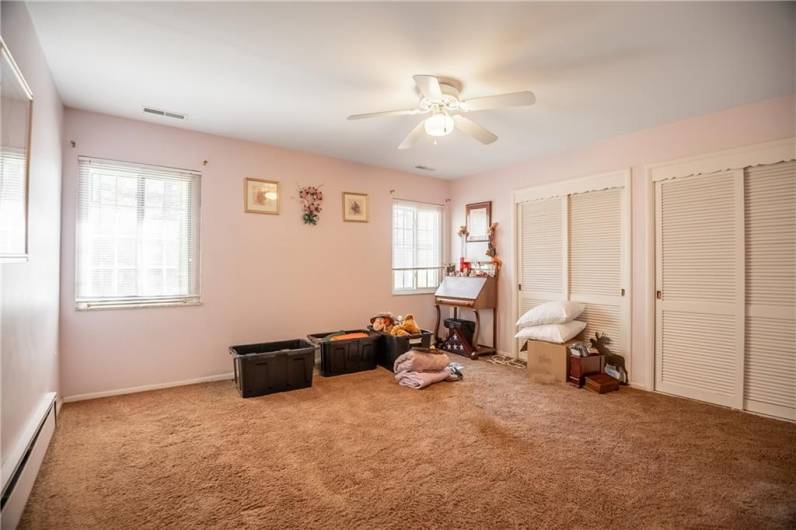 2nd spacious bedroom with double closets.