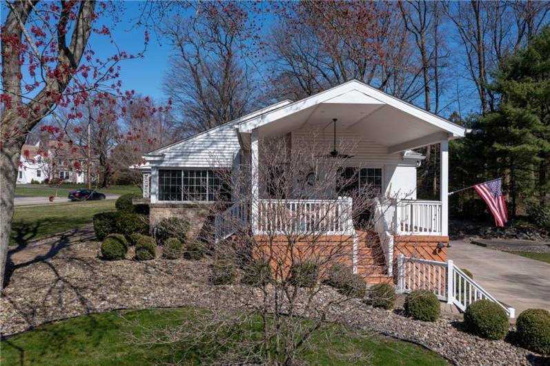 Enjoy your morning coffee on this covered deck located right off of the kitchen and dining area.