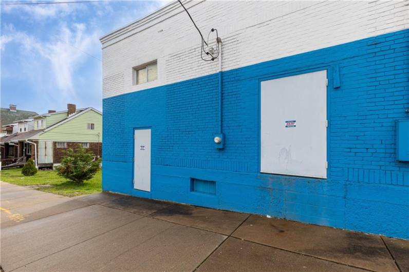 The E. 17th Avenue side of the building has a loading dock.