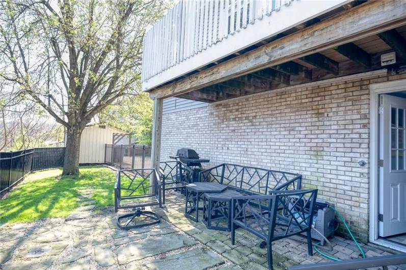 Private patio from lower-level. (Outdoor shower to the right, not visible here, has never worked during Sellers' ownership.)