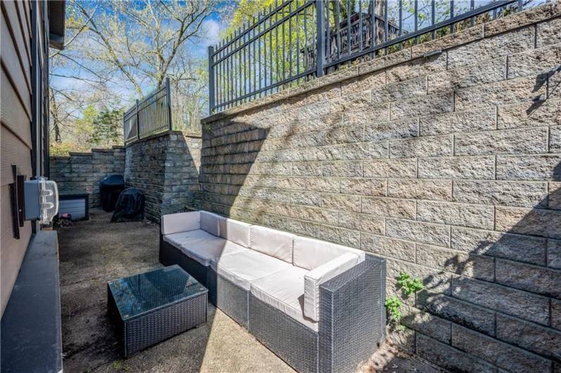 Privacy awaits you on this patio with room to grill and relax!