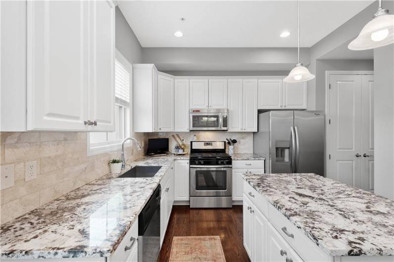 Lots of beautiful granite counter space to meal prep!