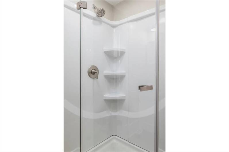 The main level bathroom offers this new shower.