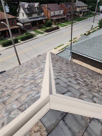 Roof Gutter System to protect slate roof